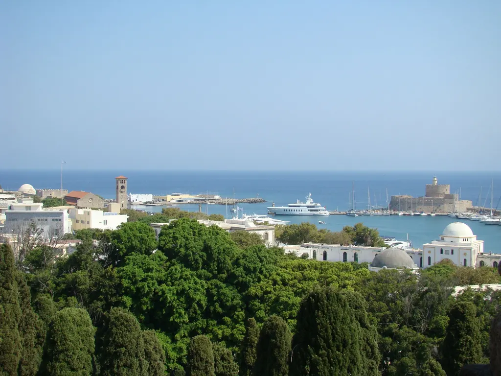 View over Rhodes Town to Mandraki harbour and the fort of Saint Nicholas